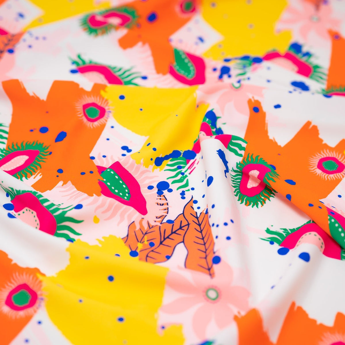 A crumpled piece of Anemone Garden Printed Spandex in Multi Color 