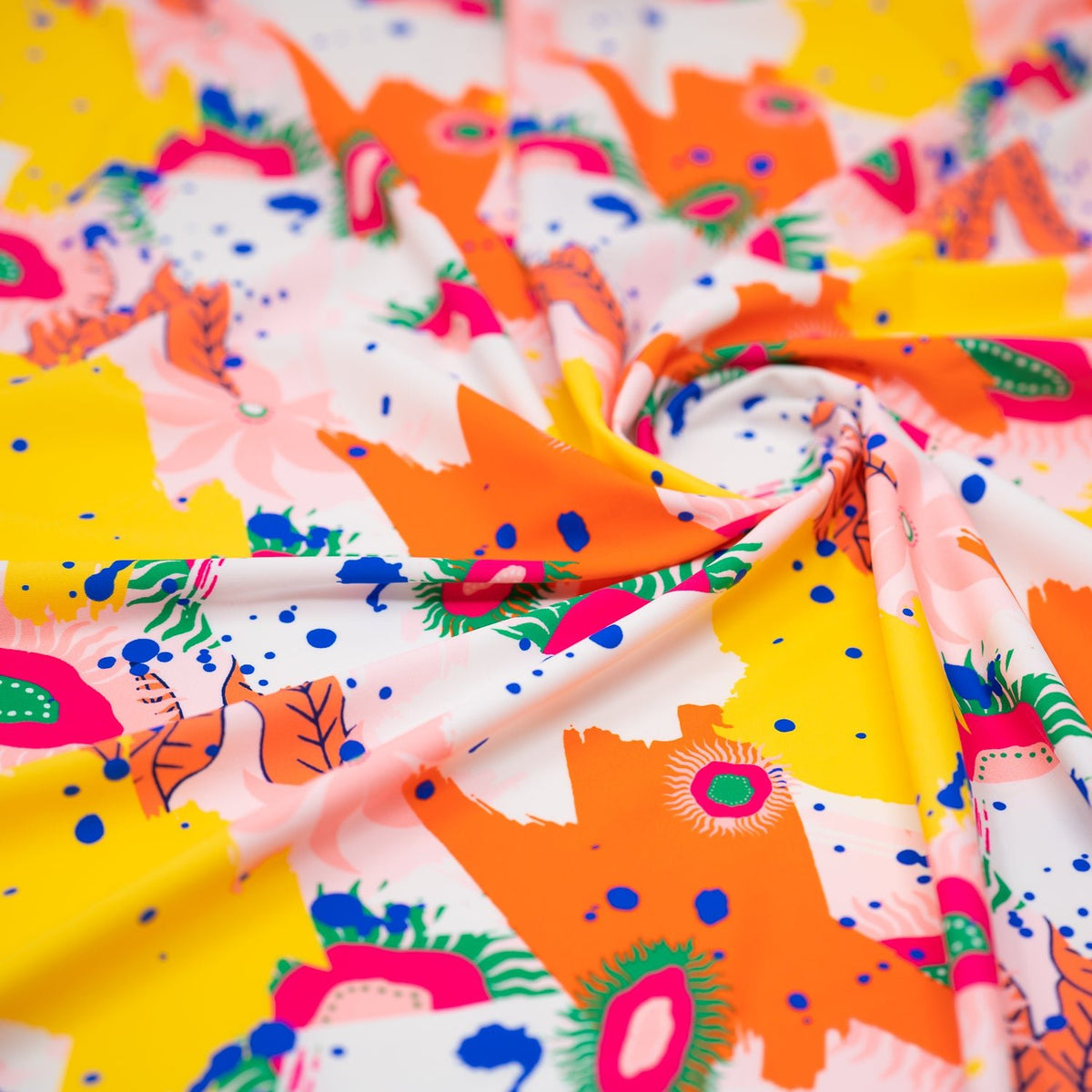 Swirled piece of Anemone Garden Printed Spandex in Multi Color