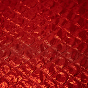 Detailed shot of Betty Embossed Metallic Polyester in Red.