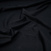 Detailed shot of Geometric Embossed Matte Spandex Tricot in Black.