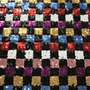 A flat sample of glistenup stretch mesh sequin.