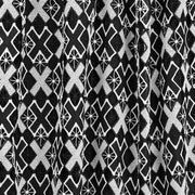 A draped sample of Knockout Mechanical Lace on a black background.