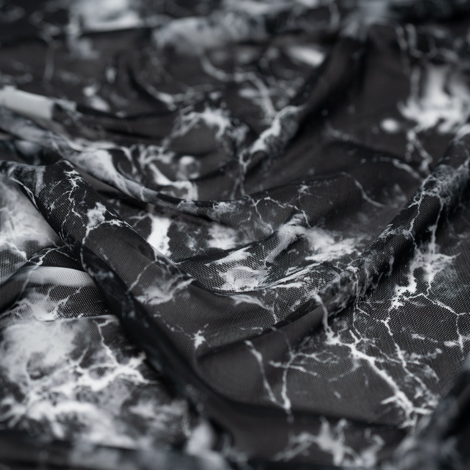 Detailed shot of Magic Marble Printed Power Mesh