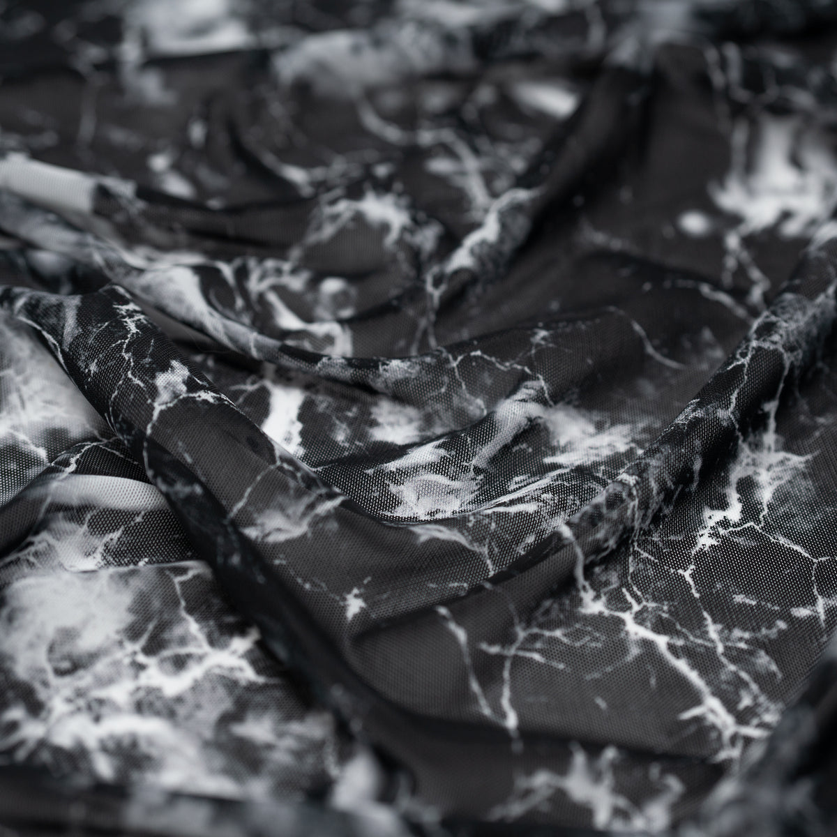 Detailed shot of Magic Marble Printed Power Mesh