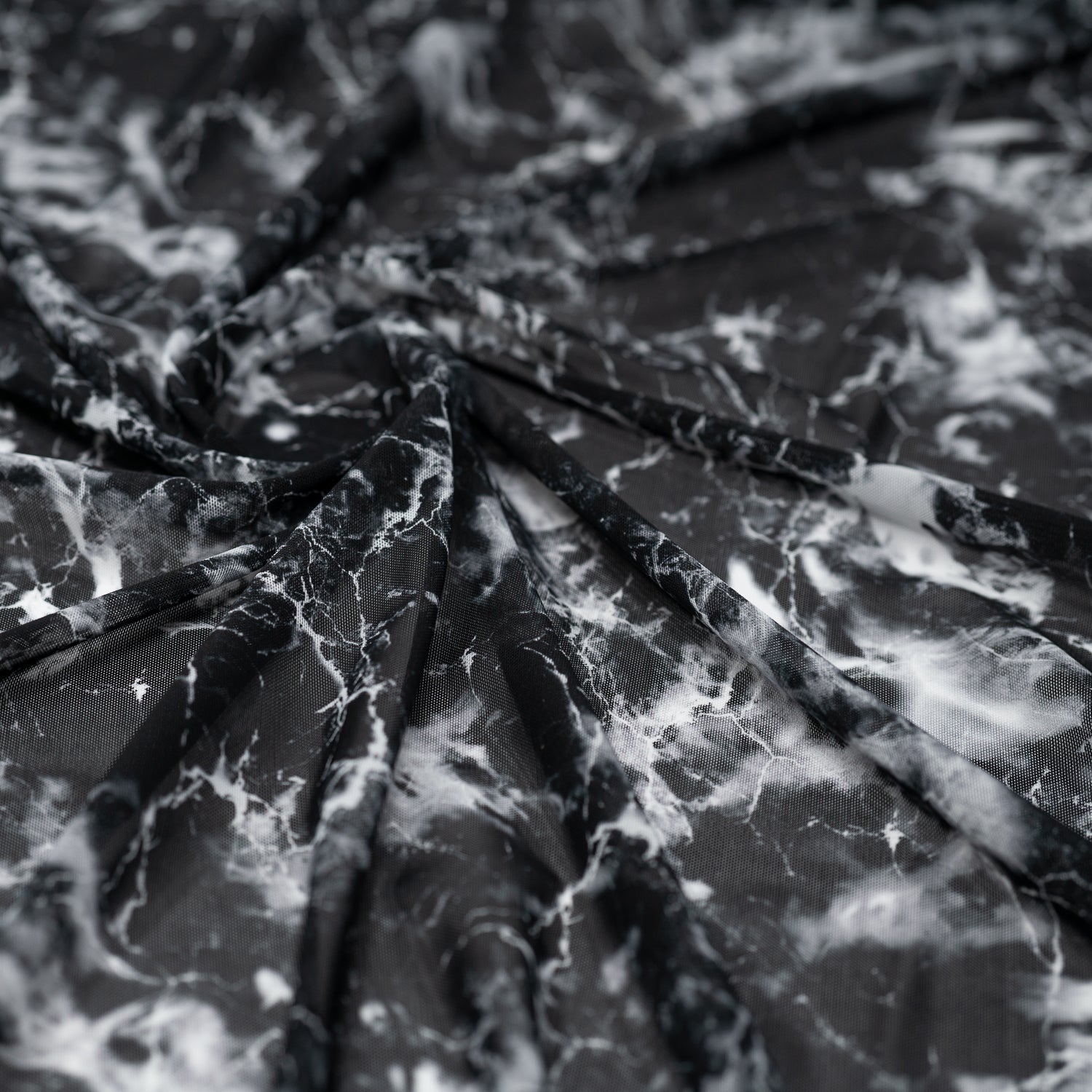 Swirled sample shot of Magic Marble Printed Power Mesh