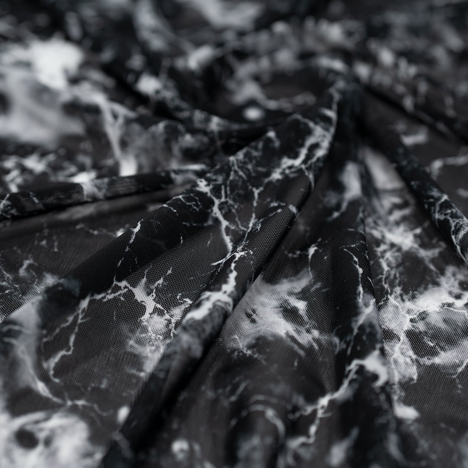 Swirled sample shot of Magic Marble Printed Power Mesh