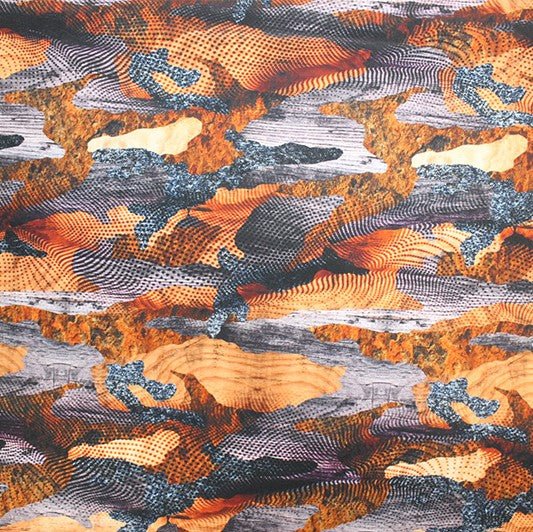 A flat sample of camo brown printed spandex.