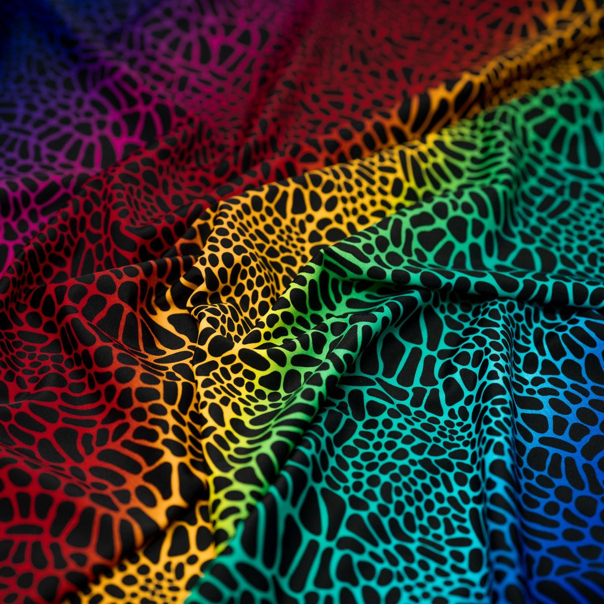 A crumpled piece of Multicolor Safari Spots Printed Spandex