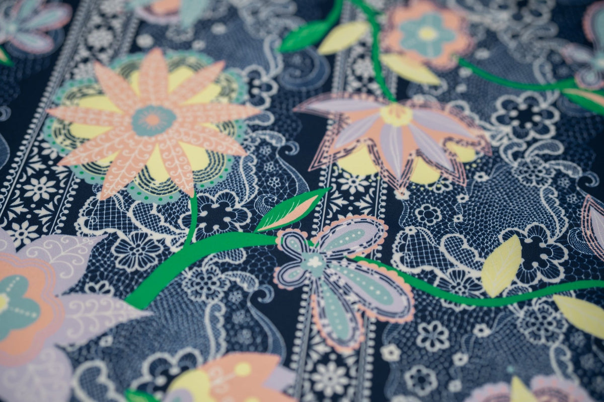 A flat sample of Chantilly Floral Lace Printed Spandex
