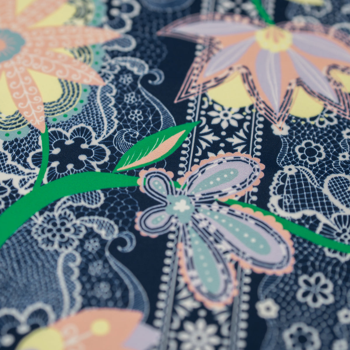 A flat sample of Chantilly Floral Lace Printed Spandex