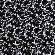 A flat sample of white Marble Printed Spandex on black.