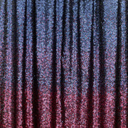 A draped sample of ombre stretch mesh sequin in the color navy-burgundy.