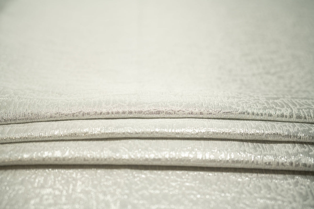 Detailed shot of Snow Storm Metallic Brocade.
