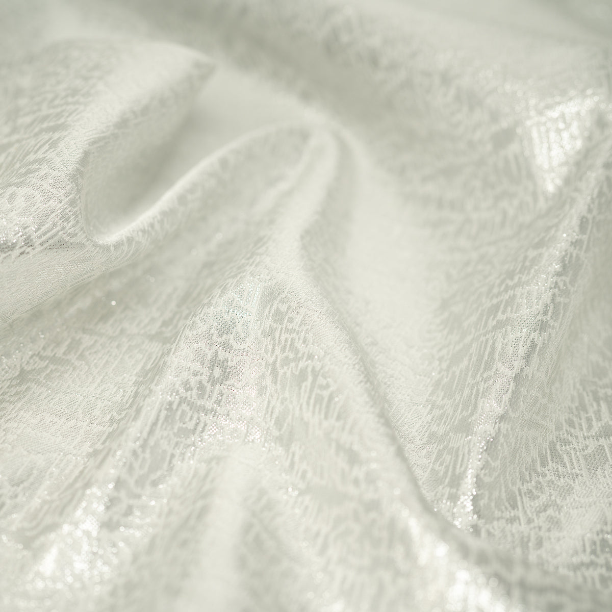 Detailed shot of Snow Storm Metallic Brocade.