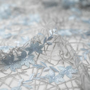Detailed shot of Spring Has Sprung Embroidered Mesh Fabric in the color blue