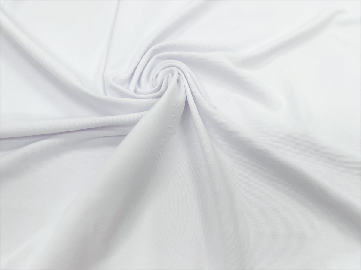 A swirled piece of Uniflex Jersey Knit in the color white