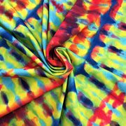 A swirled piece of double-sided tie-dye and stars polyester printed spandex.